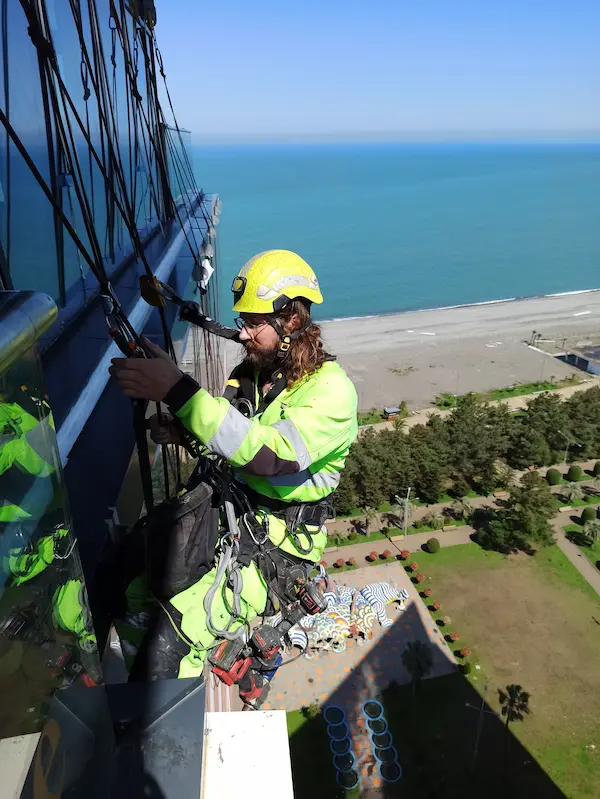 Industrial climbers installing high-altitude equipment